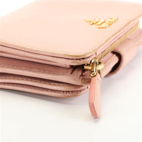 prada orchidea small wallet oro|farfetch prada wallet.